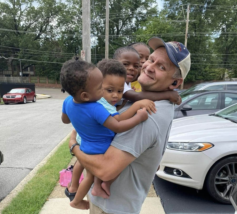 What's better than 1 baby? FOUR! John Lewis outside one of the abortion facilities where he advocates for life