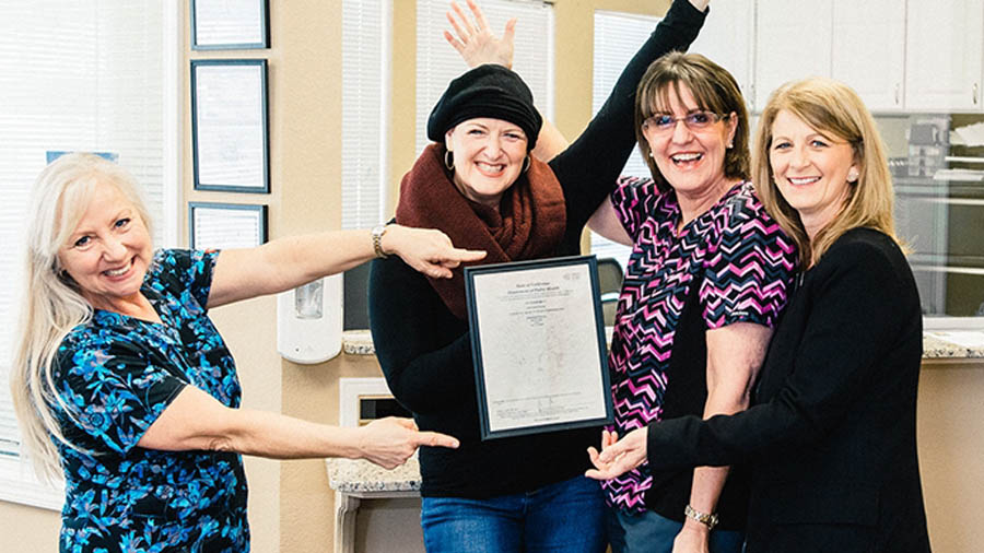 Christine Vatuone (center left) battles metastatic breast cancer while serving women and the unborn as executive director for Informed Choices in Gilroy, California.