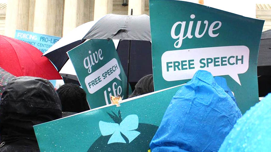 NIFLA supporters rally outside the Supreme Court on March 20 as the Court hears oral arguments in NIFLA v. Becerra.